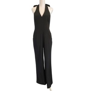 Bebe Low-Cut Halter Top Wide Leg Old Money Jumpsuit w/ front pockets, Black SZ 6